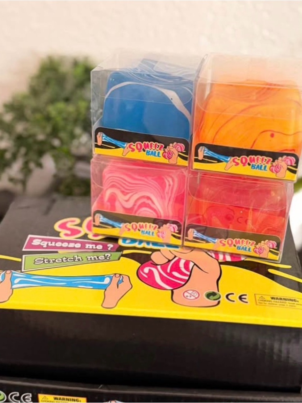 4 Squeeze Ball Stretchy Sensory Toy - Blue, Orange, Pink, Red